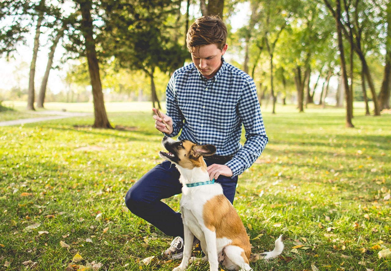 Dog with owner | Photo by Zach Lucero on Unsplash | Greystar